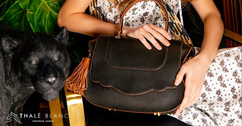 Classic Audrey brown designer satchel with camel trim.