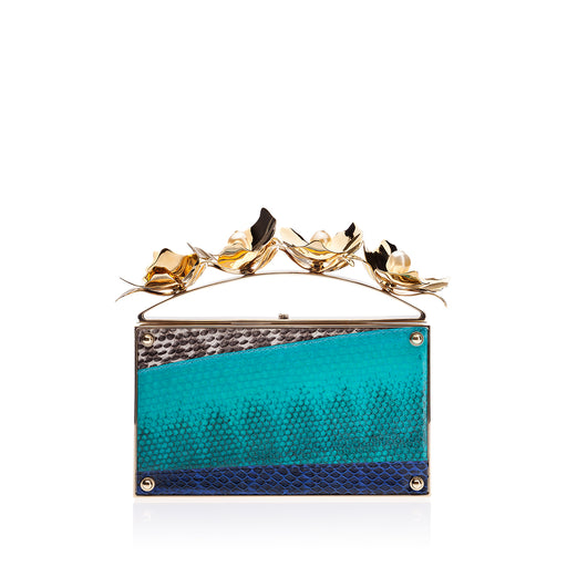 Designer clutch in blue snakeskin with brass & pearl ornament