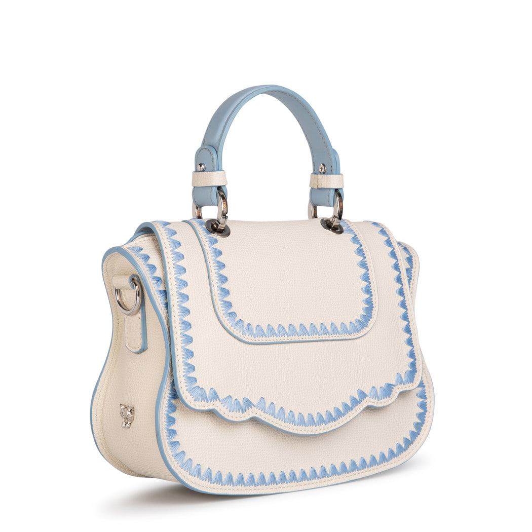 Luxury crossbody bag in white Audrey handbag style.