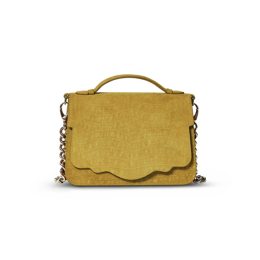 This best-selling top handle luxury leather bag in mustard sueded calfskin with all-over textured crocodile print features both a detachable crossbody leather strap and a detachable chain strap. Make it your own with a fur Duma Hok-Pom or our signature leather tassel or opt for one of our leather guitar straps for an on-trend look. It is one of the easiest to accessorize handbags.
