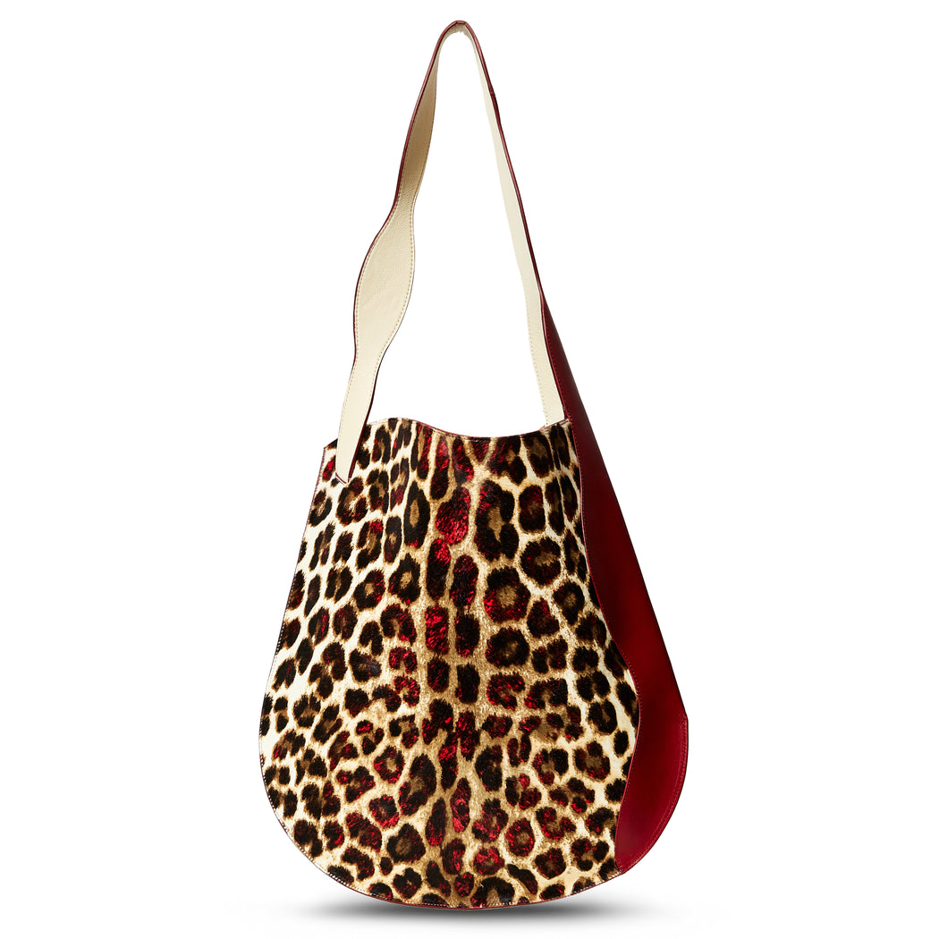 Designer shoulder bag with leopard calf hair 