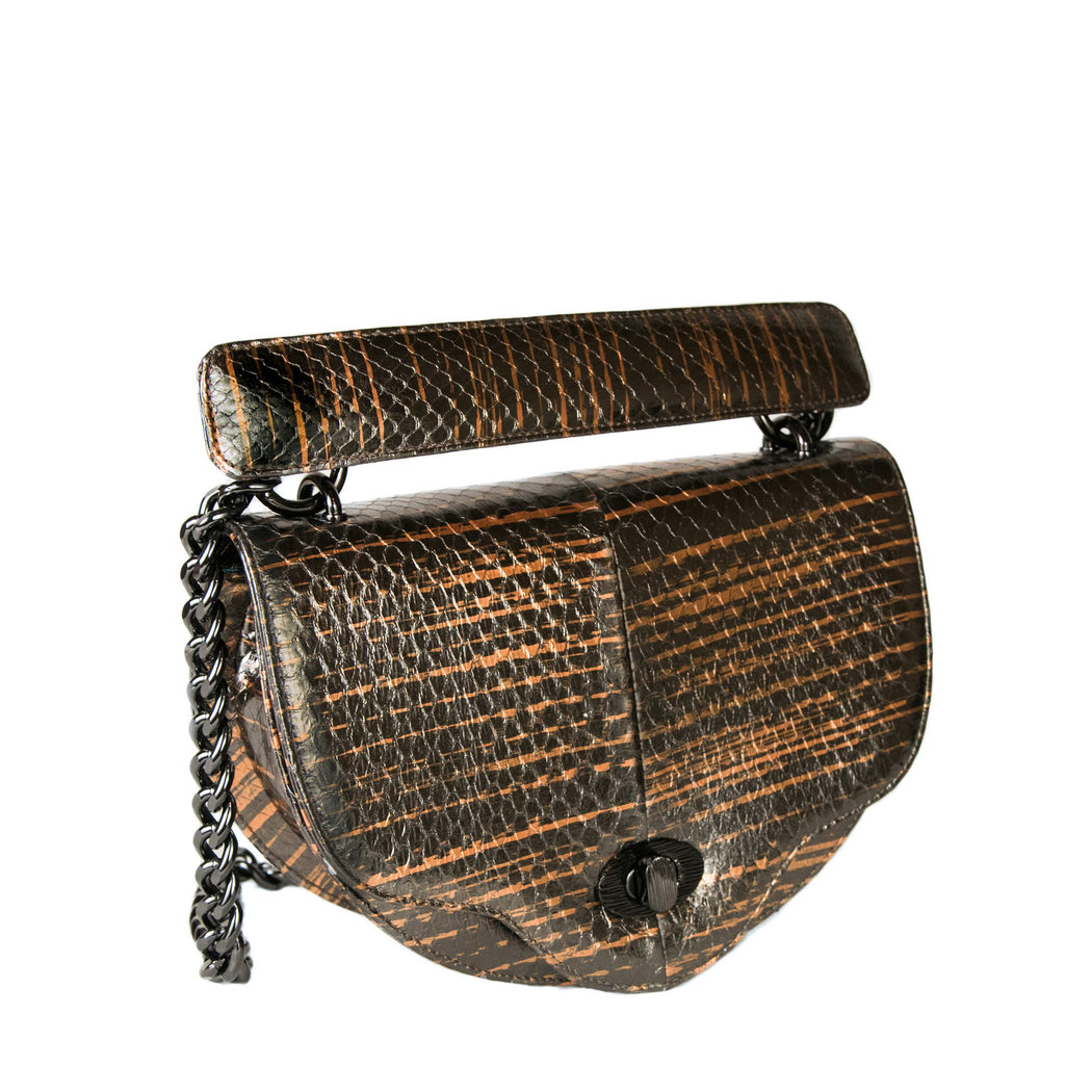 Luxury crossbody handbag in brown snakeskin with chain strap, crescent-shaped