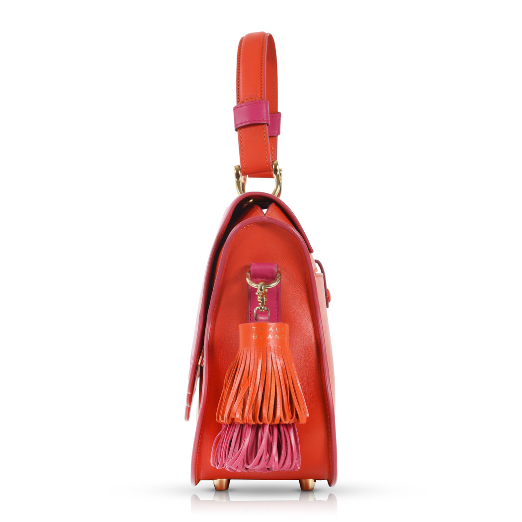 Audrey Satchel: Orange Designer Handbag with Orange & Pink Drip Design