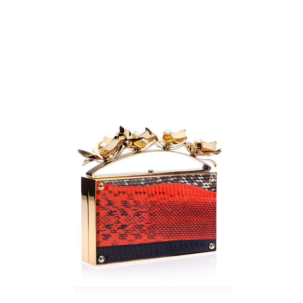 Designer clutch: Red snakeskin purse with brass adornment